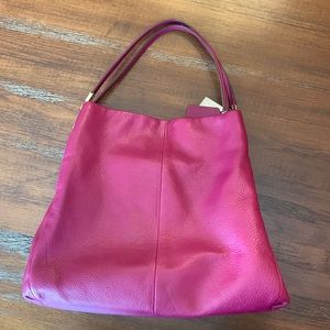 Coach Phoebe handbag w drawstring dust cover. Beautiful magenta color. Like new!